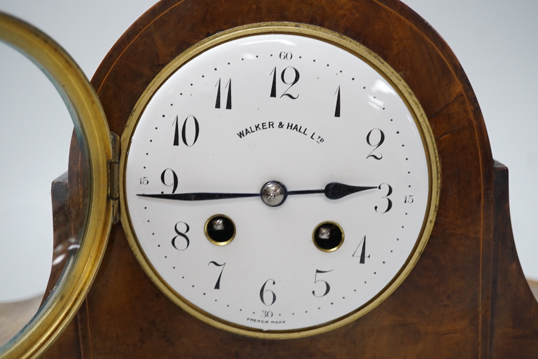 A burr walnut mantel clock, 33cms wide